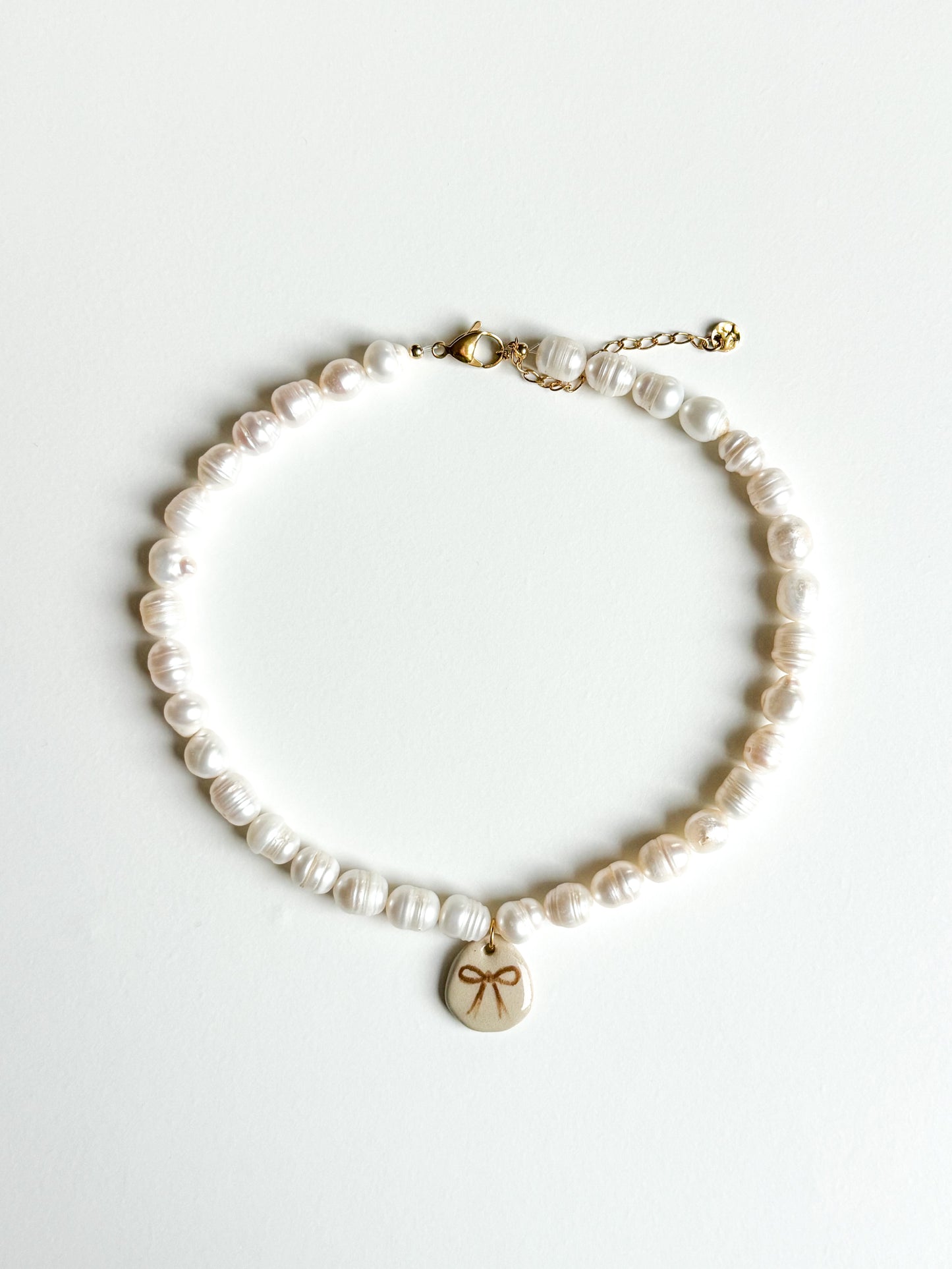 Collier noeud et perles d’eau douce