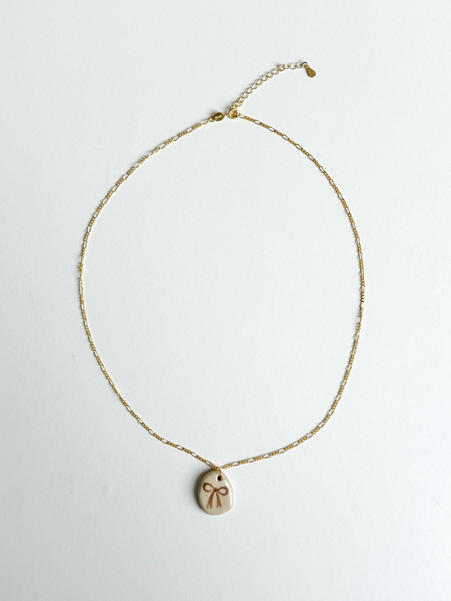 Collier en plaqué or noeud