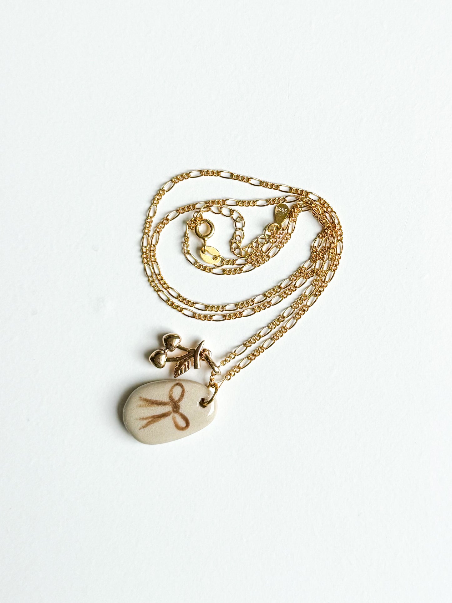 Collier noeud & cerise