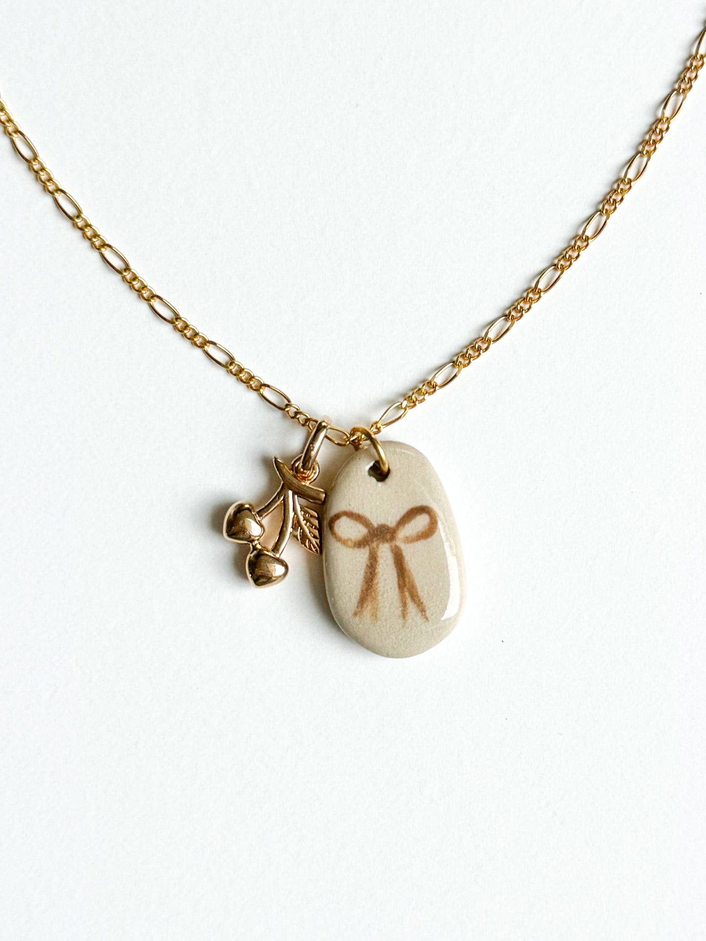 Collier noeud & cerise