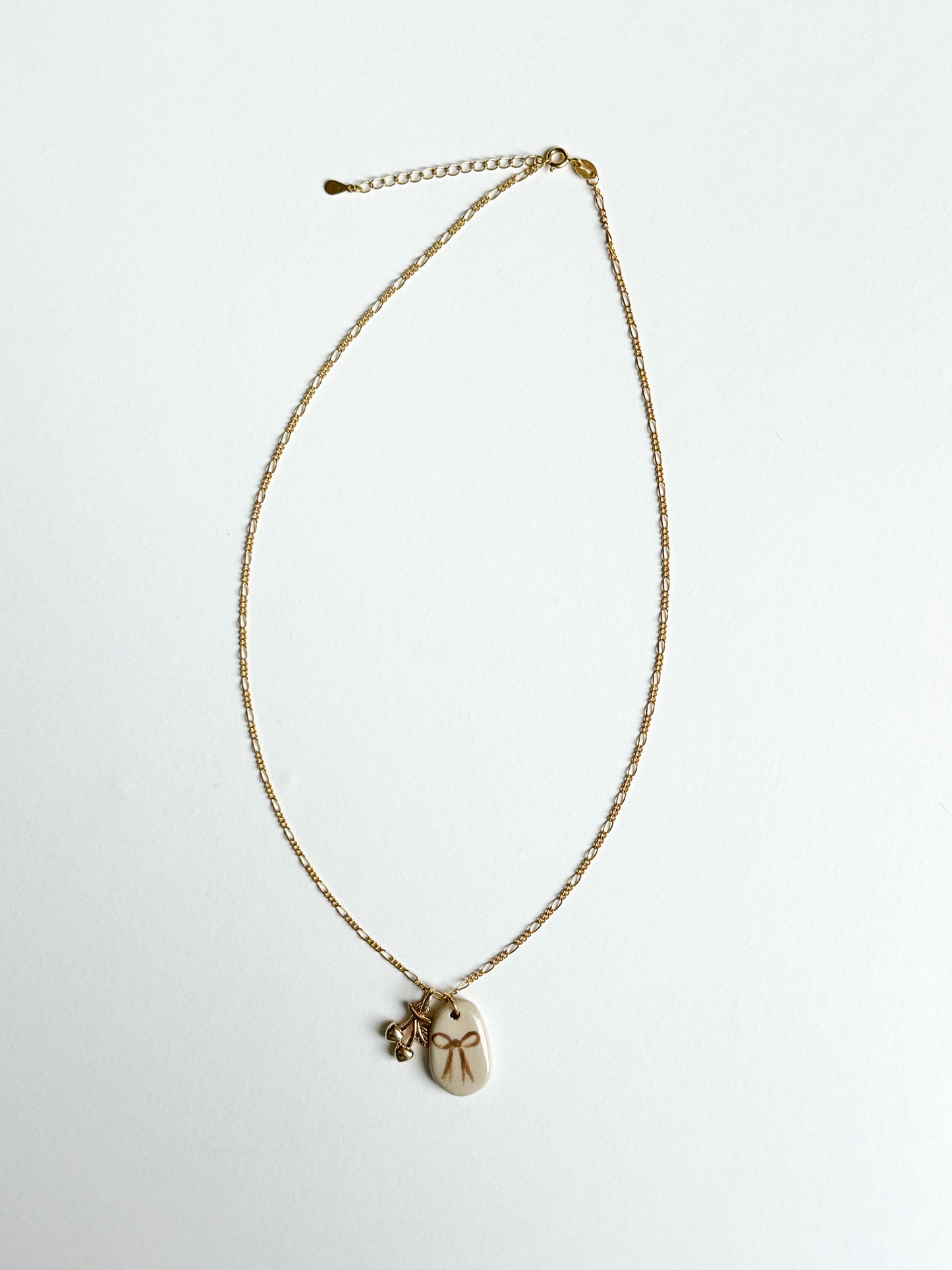 Collier noeud & cerise