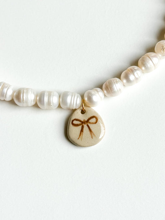 Collier noeud et perles d’eau douce